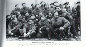 Ted Reynolds with B coy 6th Plt 7th from left sitting